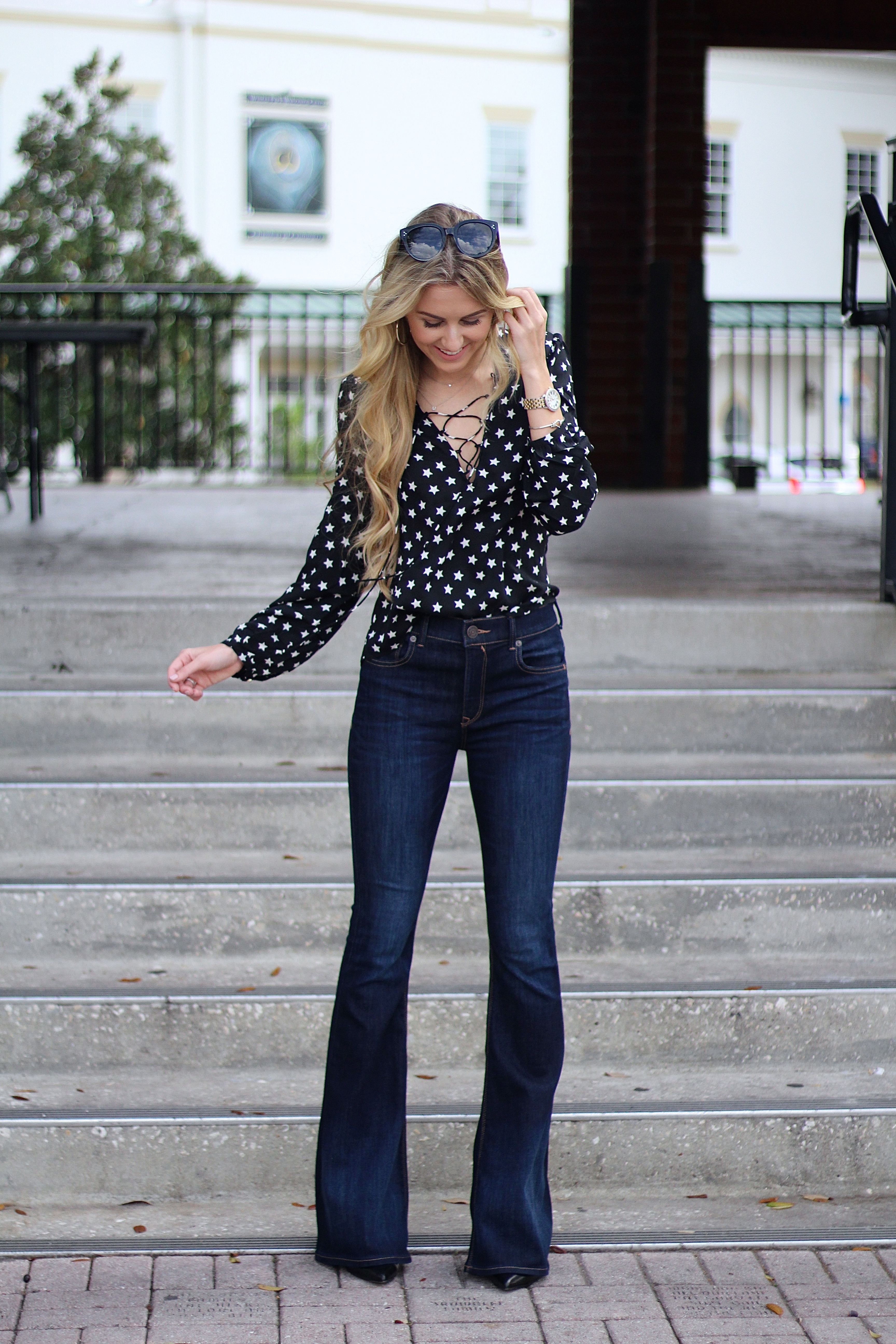 flare jeans with stars on them